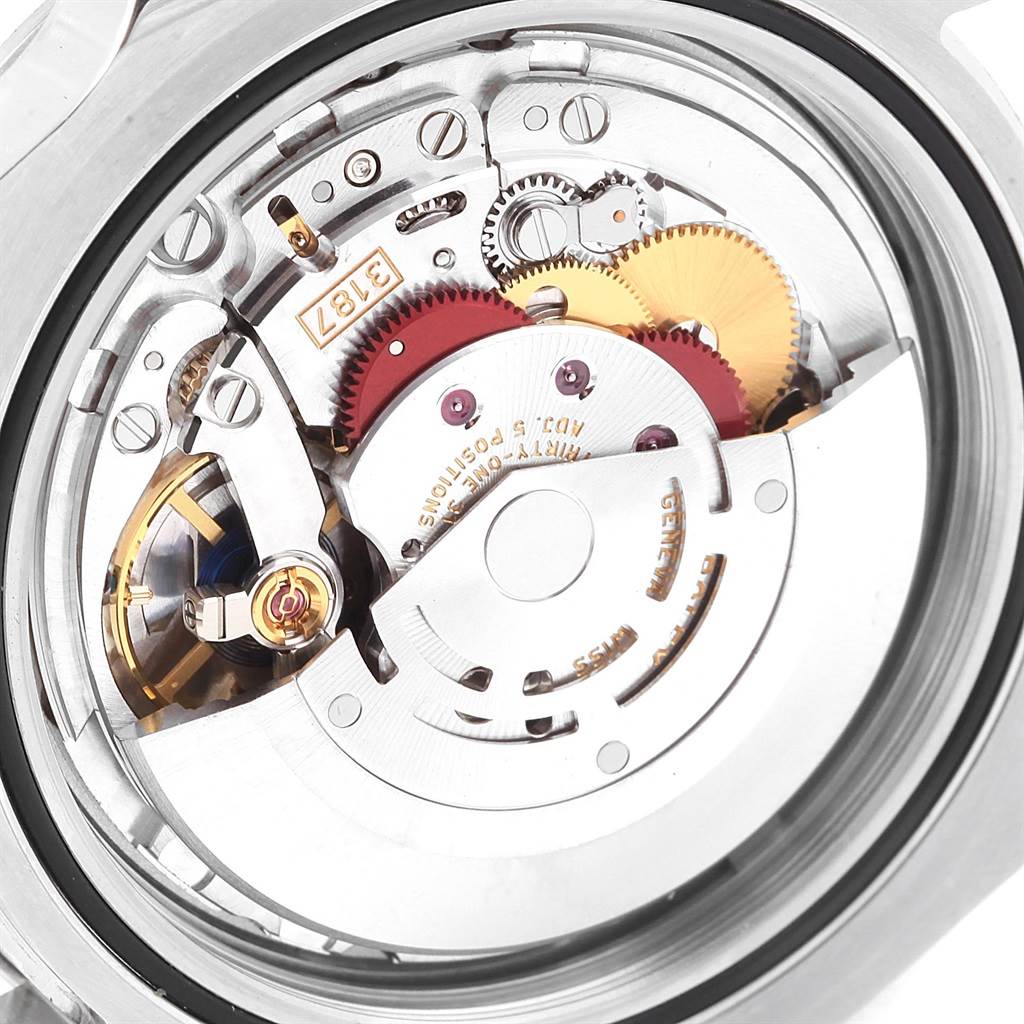 The image shows the movement and internal mechanism of a Rolex Explorer 216570 Men's Stainless Steel Black Dial 216570 Men's Stainless Steel Black Dial model watch.