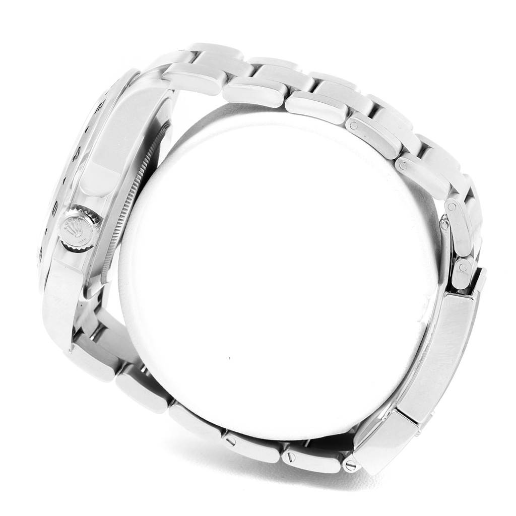 The image shows a side view of the Rolex Explorer 216570 Men's Stainless Steel Black Dial 216570 Men's Stainless Steel Black Dial watch, highlighting its bracelet and crown.