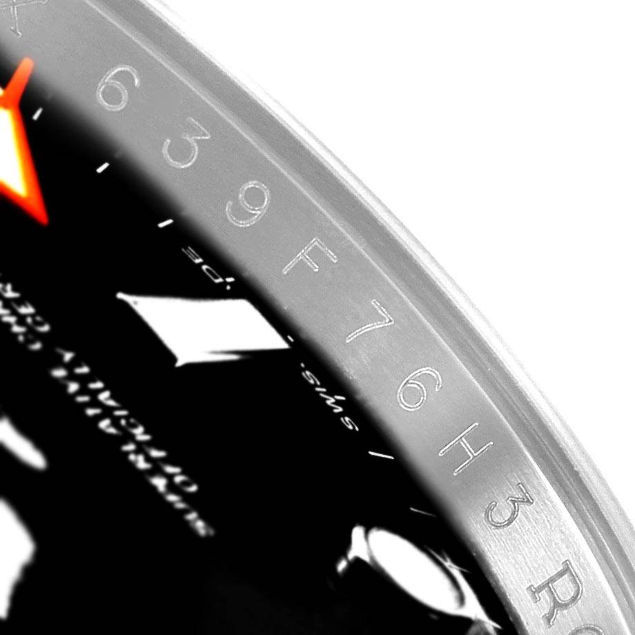 The image shows a close-up view of the dial and inner bezel of a Rolex Explorer 216570 Men's Stainless Steel Black Dial 216570 Men's Stainless Steel Black Dial watch.