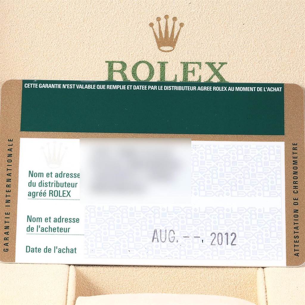 The image shows the warranty card for a Rolex Explorer 216570 Men's Stainless Steel White Dial 216570 Men's Stainless Steel White Dial, displaying the date of purchase and Rolex branding.