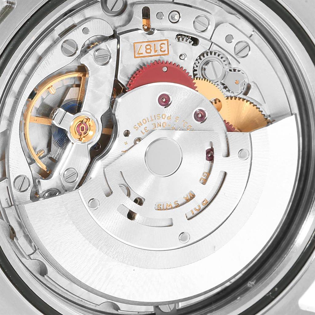 This image shows the internal mechanism of a Rolex Explorer 216570 Men's Stainless Steel White Dial 216570 Men's Stainless Steel White Dial watch, revealing gears and the movement components from a close-up angle.