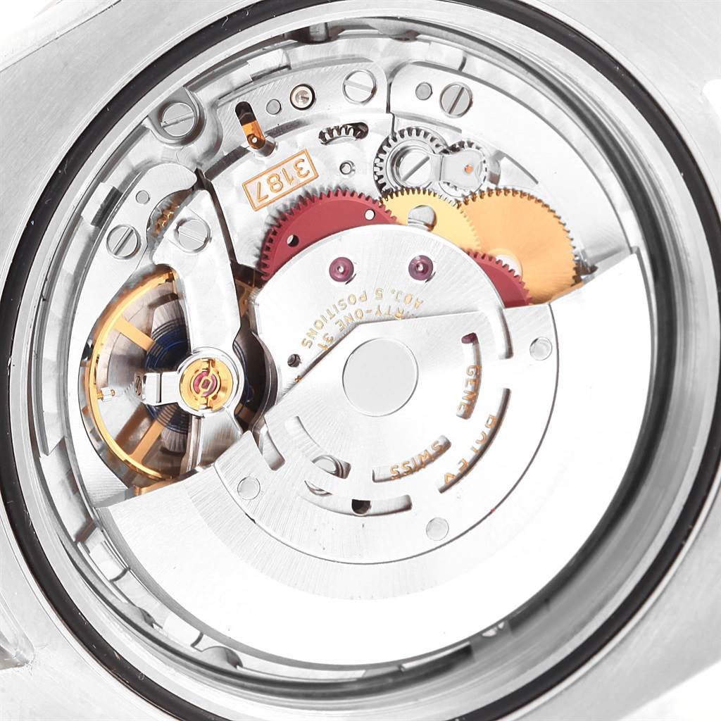 This image shows the movement and inner mechanics of the Rolex Explorer 216570 Men's Stainless Steel White Dial 216570 Men's Stainless Steel White Dial watch from a close-up, rear angle.