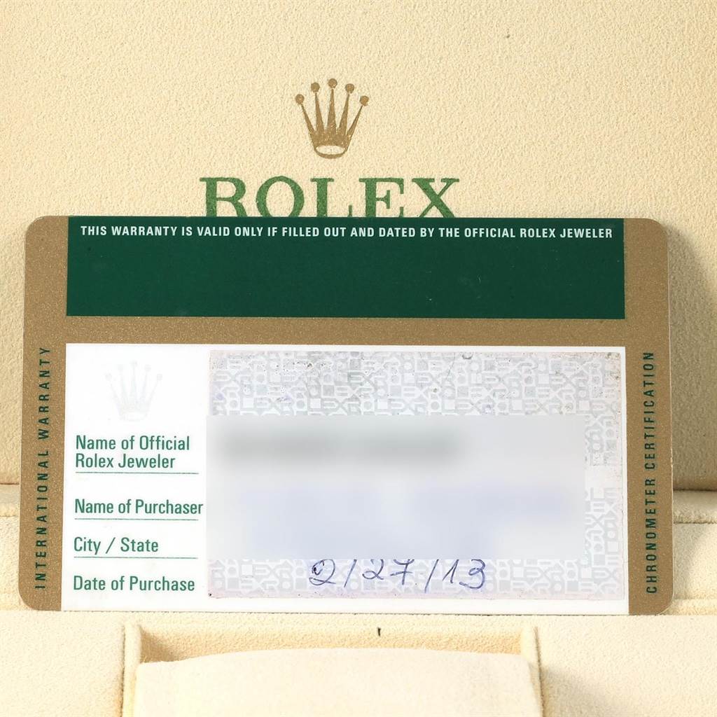 The image shows a warranty card for a Rolex Explorer 216570 Men's Stainless Steel White Dial 216570 Men's Stainless Steel White Dial watch, featuring the brand's logo and certification details.