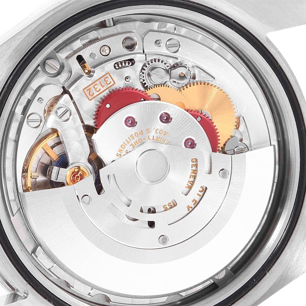 This image shows the internal mechanical movement of a Rolex Explorer 214270 Men's Stainless Steel Black Dial 214270 Men's Stainless Steel Black Dial watch from a rear angle.