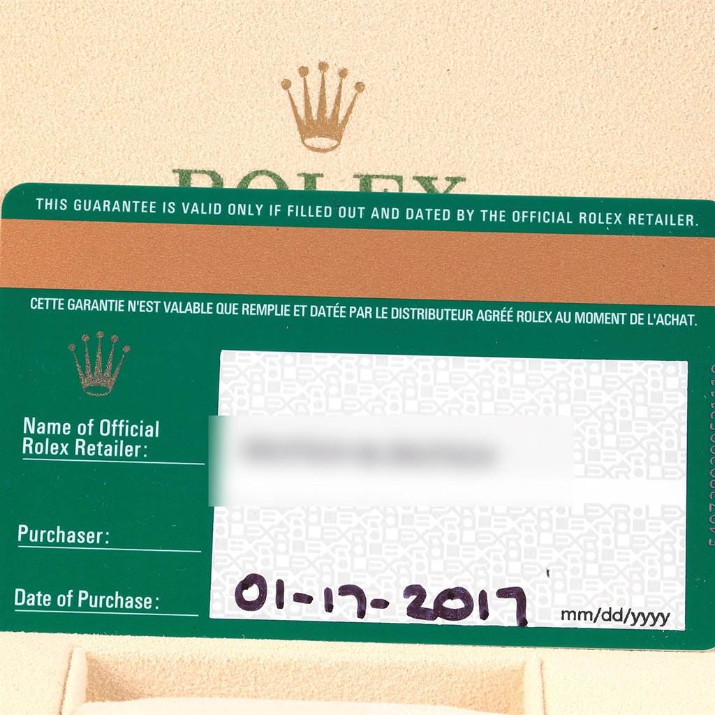 The image shows a warranty card for the Rolex Explorer 214270 Men's Stainless Steel Black Dial 214270 Men's Stainless Steel Black Dial model, including details of the official retailer, purchaser, and date of purchase.