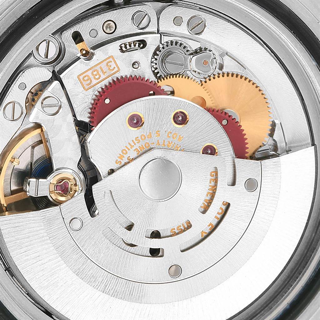 This close-up image shows the intricate inner mechanism of the Rolex Explorer 16570 Men's Stainless Steel Black Dial 16570 Men's Stainless Steel Black Dial watch model's movement.