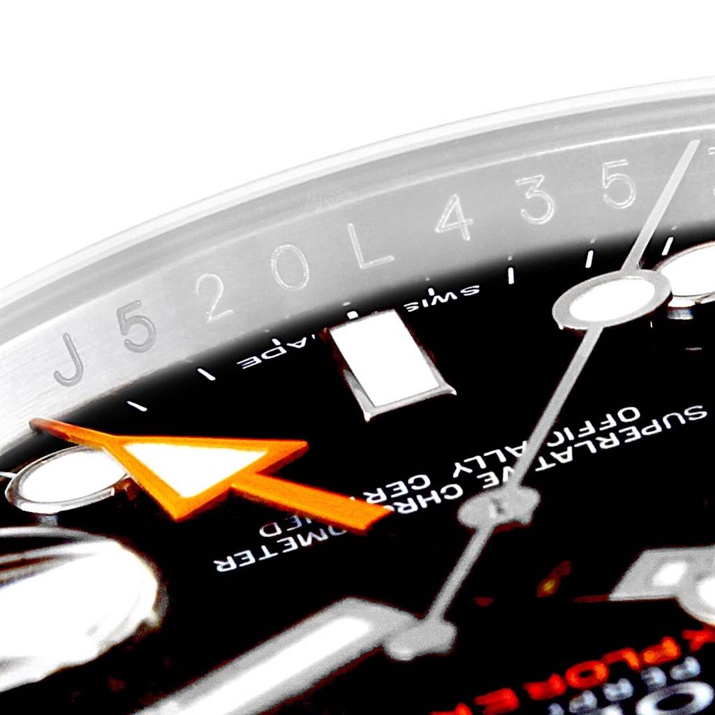 This image shows a close-up angle of the dial and part of the bezel of a Rolex Explorer 216570 Men's Stainless Steel Black Dial 216570 Men's Stainless Steel Black Dial watch, highlighting the hands and markers.