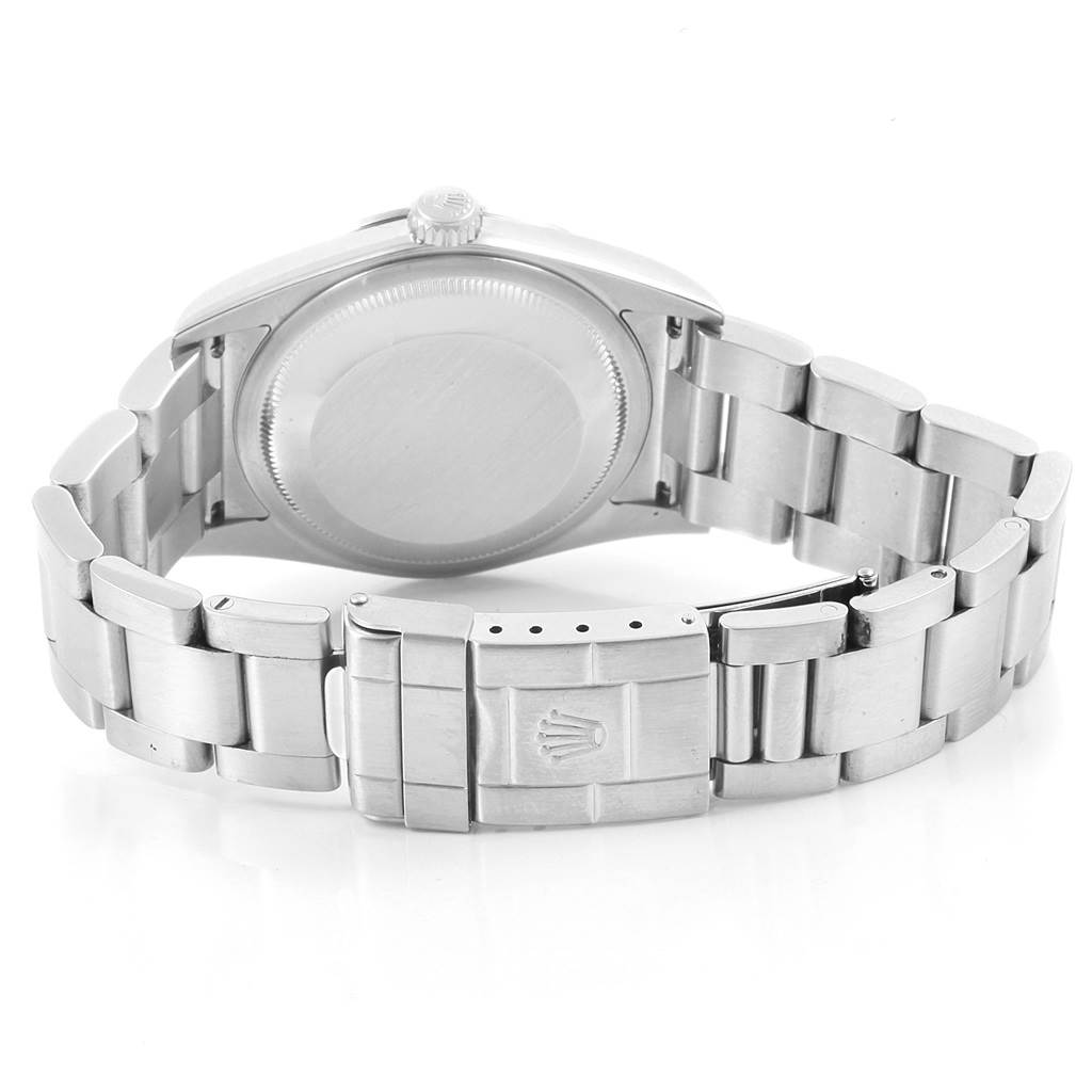 The image shows the rear view of the Rolex Explorer 114270 Men's Stainless Steel Black Dial 114270 Men's Stainless Steel Black Dial watch, highlighting the closed clasp, case back, and bracelet.