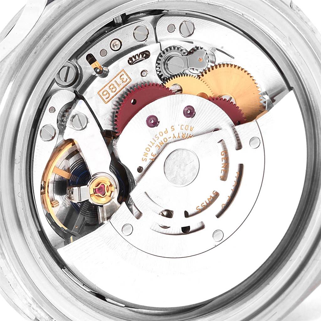 The image shows the internal mechanism of the Rolex Explorer 16570 Men's Stainless Steel Black Dial 16570 Men's Stainless Steel Black Dial watch from a close-up angle, highlighting the gears and movement components.