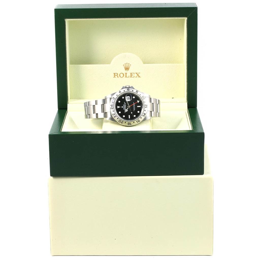 The image shows a Rolex Explorer 16570 Men's Stainless Steel Black Dial 16570 Men's Stainless Steel Black Dial watch in an open green box with the brand logo inside.
