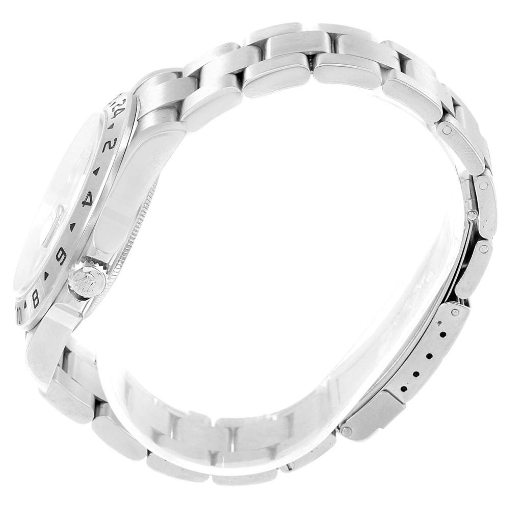 The image shows a side view of a Rolex Explorer 16570 Men's Stainless Steel Black Dial 16570 Men's Stainless Steel Black Dial model watch, highlighting its bezel, crown, and bracelet.