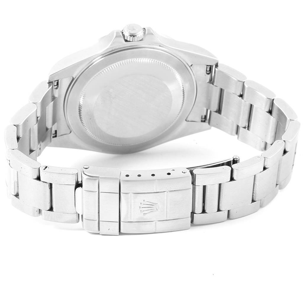 The image shows the back case and clasp of a Rolex Explorer 16570 Men's Stainless Steel Black Dial 16570 Men's Stainless Steel Black Dial watch, highlighting the bracelet's links and clasp mechanism.