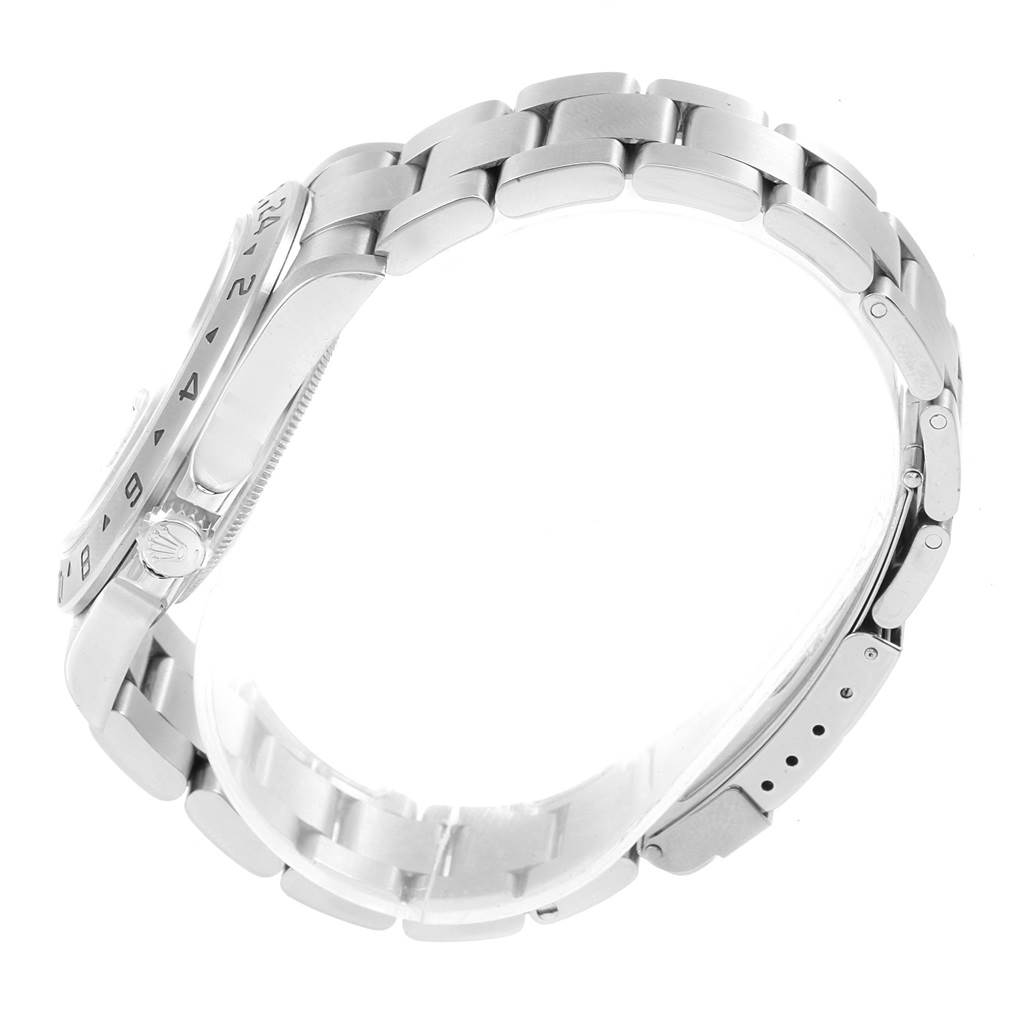 The image shows a side view of the Rolex Explorer 16570 Men's Stainless Steel Black Dial 16570 Men's Stainless Steel Black Dial watch, showcasing its stainless steel bracelet, bezel, and crown.