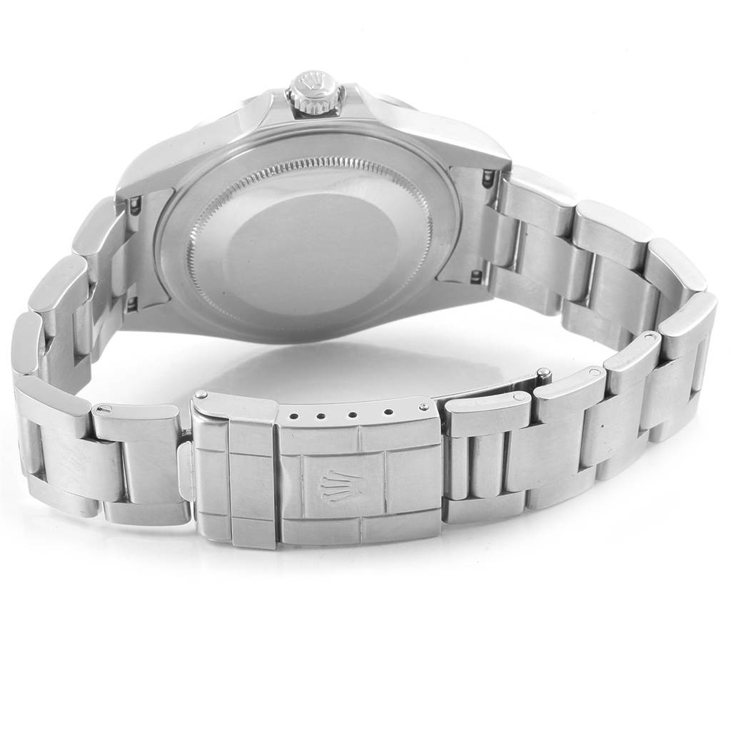 The image shows the back view of the Rolex Explorer 16570 Men's Stainless Steel Black Dial 16570 Men's Stainless Steel Black Dial, highlighting its case back, crown, and bracelet clasp.