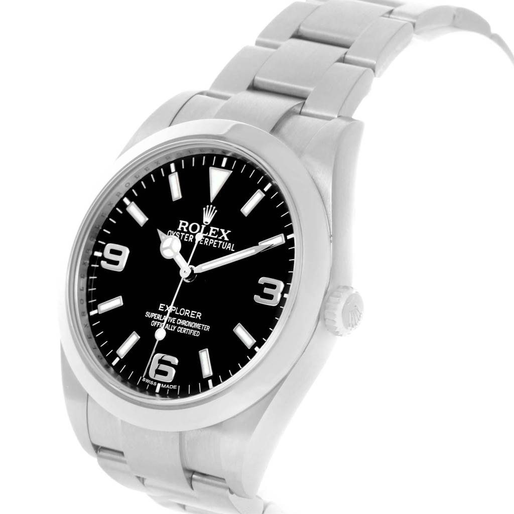 The image shows a Rolex Explorer 214270 Men's Stainless Steel Black Dial 214270 Men's Stainless Steel Black Dial watch at an angle revealing the dial, crown, and part of the stainless steel bracelet.