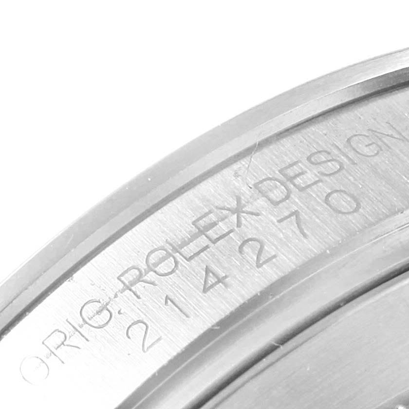 This image shows a close-up view of the side engraving on a Rolex Explorer 214270 Men's Stainless Steel Black Dial 214270 Men's Stainless Steel Black Dial watch case.
