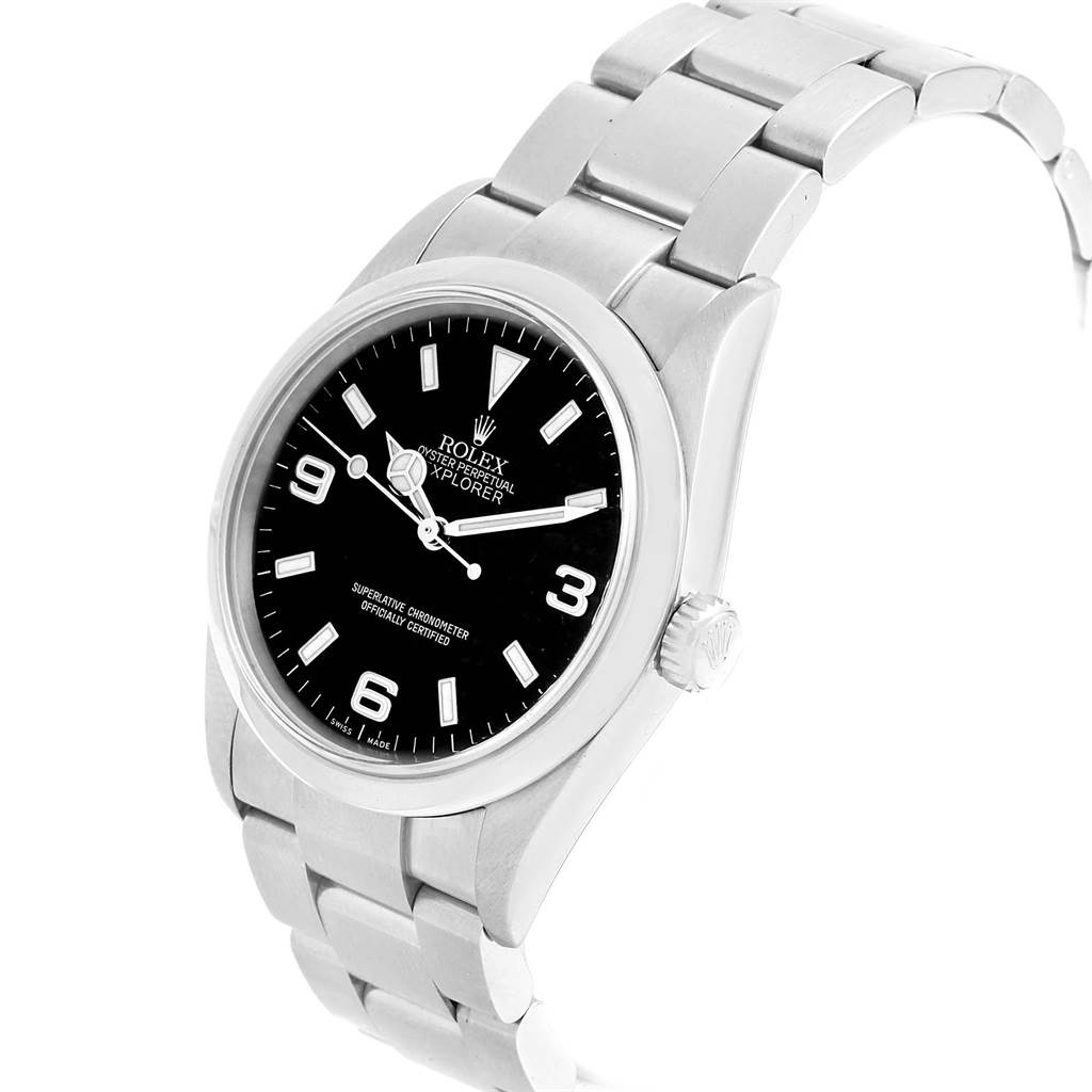 The Rolex Explorer 114270 Men's Stainless Steel Black Dial 114270 Men's Stainless Steel Black Dial watch is shown at a slight angle, revealing the face, bezel, crown, and metal bracelet.