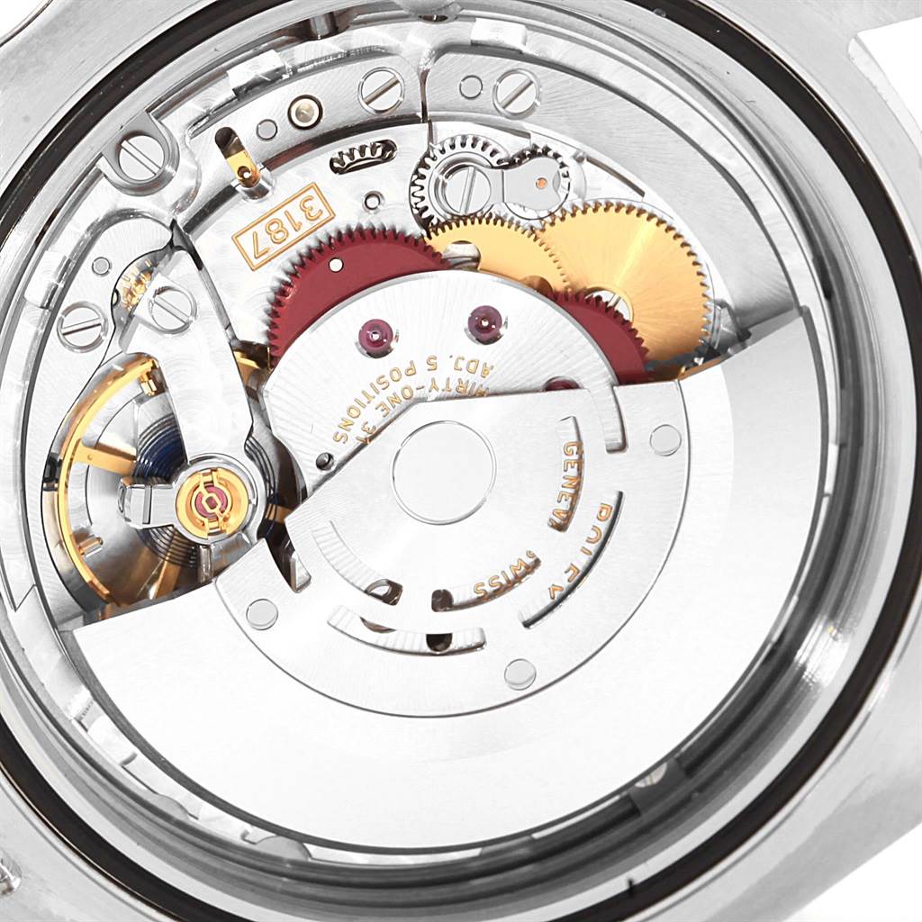 The image shows the intricate internal mechanism of a Rolex Explorer 216570 Men's Stainless Steel Black Dial 216570 Men's Stainless Steel Black Dial watch, focusing on its movement components.