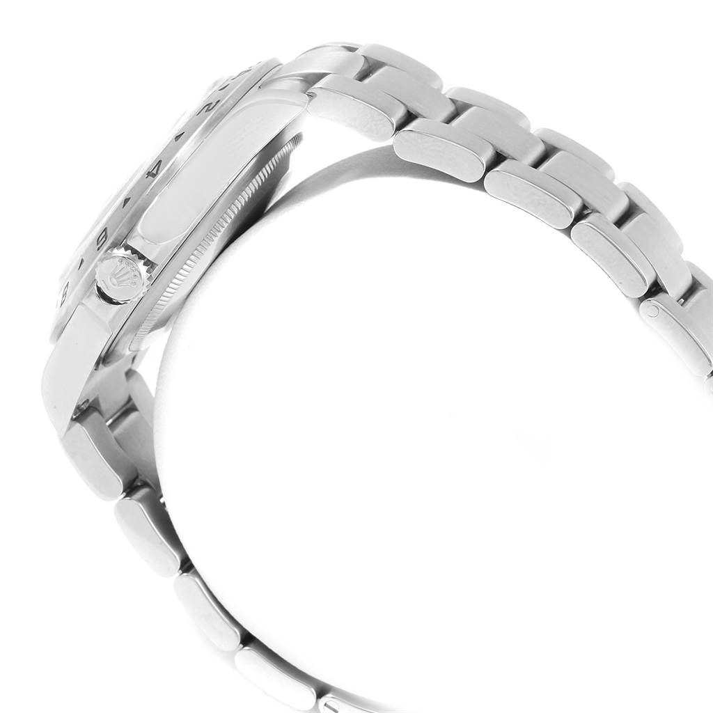 The image shows a side view of the Rolex Explorer 16570 Men's Stainless Steel Black Dial 16570 Men's Stainless Steel Black Dial's case and bracelet, highlighting the crown and links.