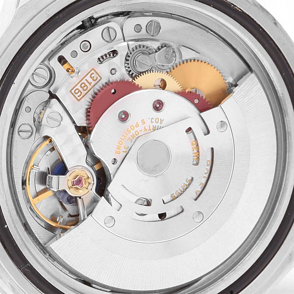 This image shows the inner mechanics and components of a Rolex Explorer 16570 Men's Stainless Steel Black Dial 16570 Men's Stainless Steel Black Dial watch, including gears and the balance wheel, viewed from the back.