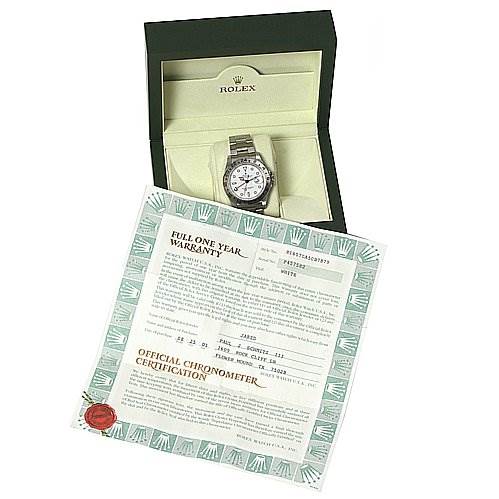 The Rolex Explorer 16570 Men's Stainless Steel White Dial 16570 Men's Stainless Steel White Dial watch is displayed in its box with warranty and official chronometer certification documents.