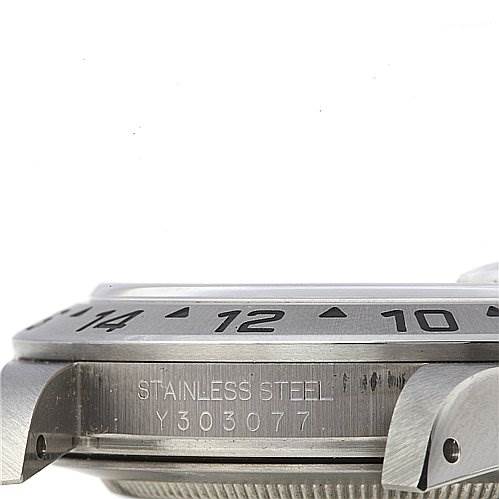 The image shows a side view of a Rolex Explorer 16570 Men's Stainless Steel White Dial 16570 Men's Stainless Steel White Dial watch case, highlighting its stainless steel material and serial number.