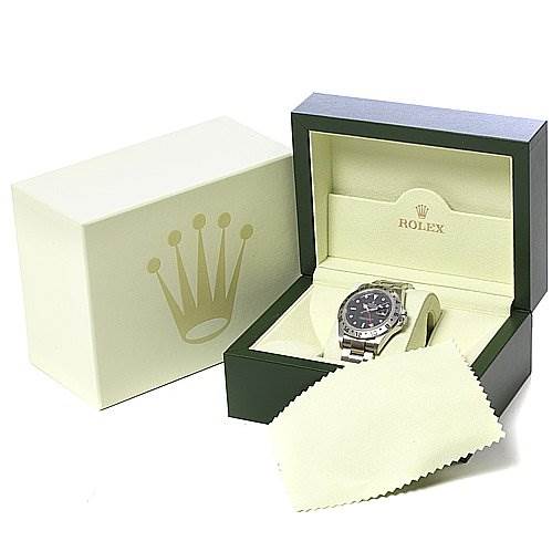 The image shows a Rolex Explorer 16570 Men's Stainless Steel Black Dial 16570 Men's Stainless Steel Black Dial watch in its open box, accompanied by an outer box and a cleaning cloth.