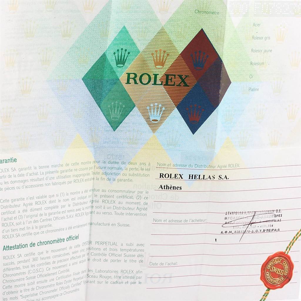 The image shows a warranty and chronometer certificate for the Rolex Explorer 16570 Men's Stainless Steel White Dial 16570 Men's Stainless Steel White Dial model, including the brand's logo and purchase details.