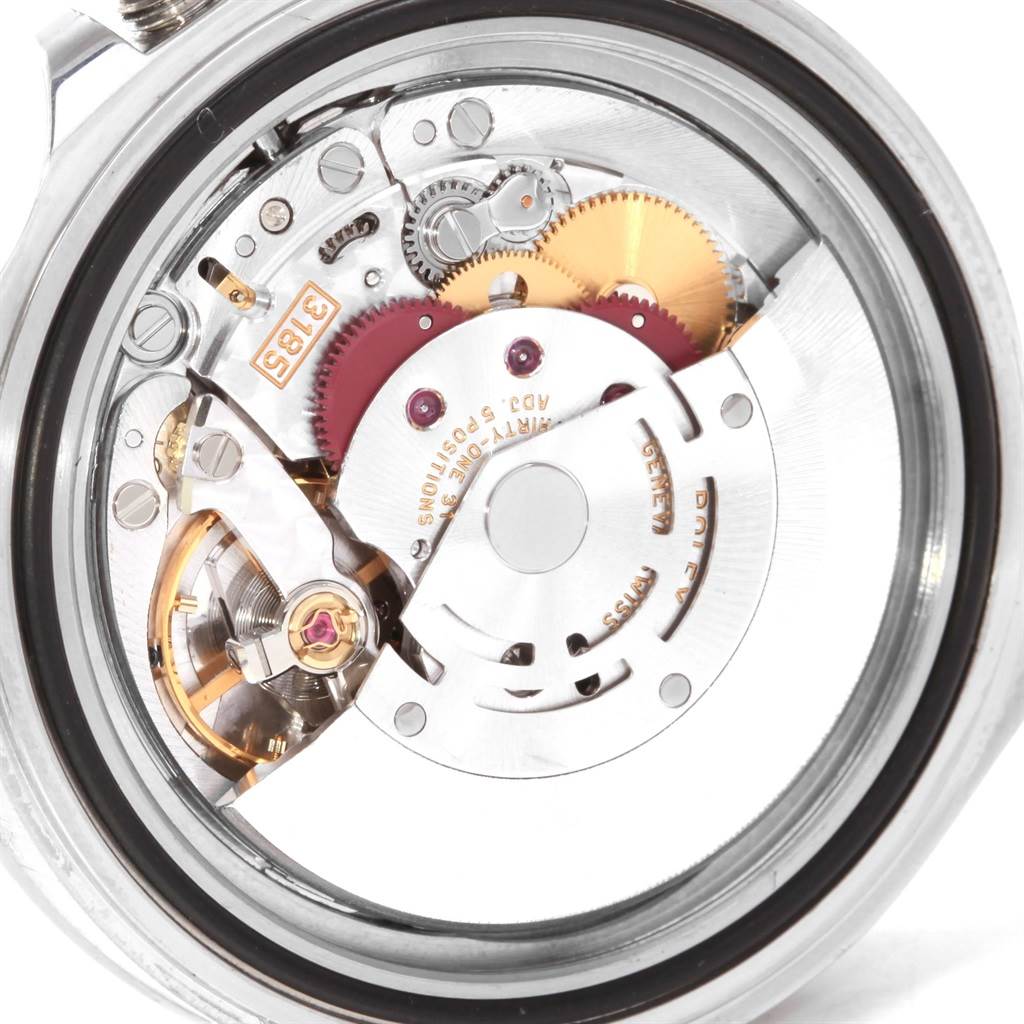 This image shows the open rear view of the Rolex Explorer 16570 Men's Stainless Steel White Dial 16570 Men's Stainless Steel White Dial watch movement, displaying its intricate gears and mechanisms.