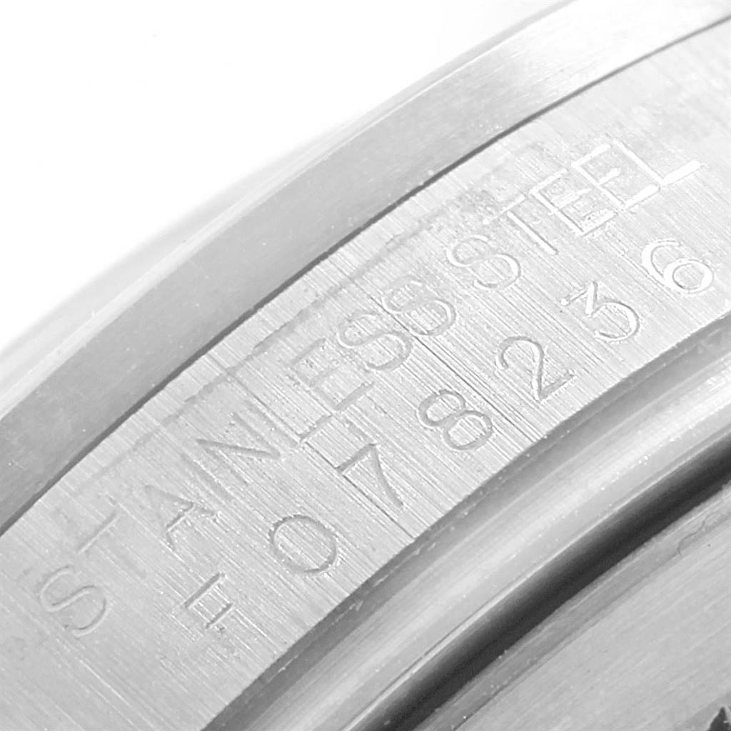 This image shows a close-up of the inner bezel with engravings on the Rolex Explorer 16570 Men's Stainless Steel White Dial 16570 Men's Stainless Steel White Dial model watch.
