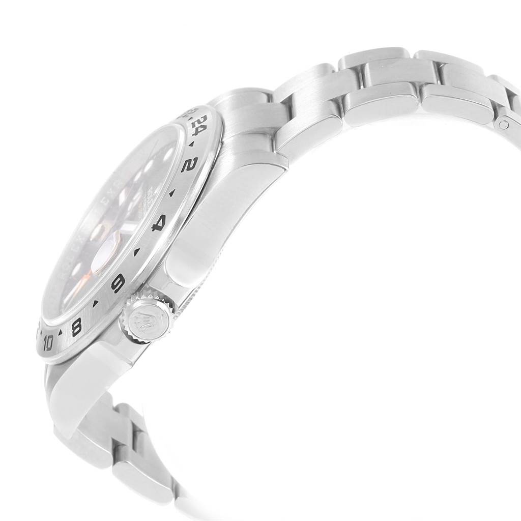 The side profile of the Rolex Explorer 216570 Men's Stainless Steel Black Dial 216570 Men's Stainless Steel Black Dial watch shows the crown, bezel, and part of the bracelet.