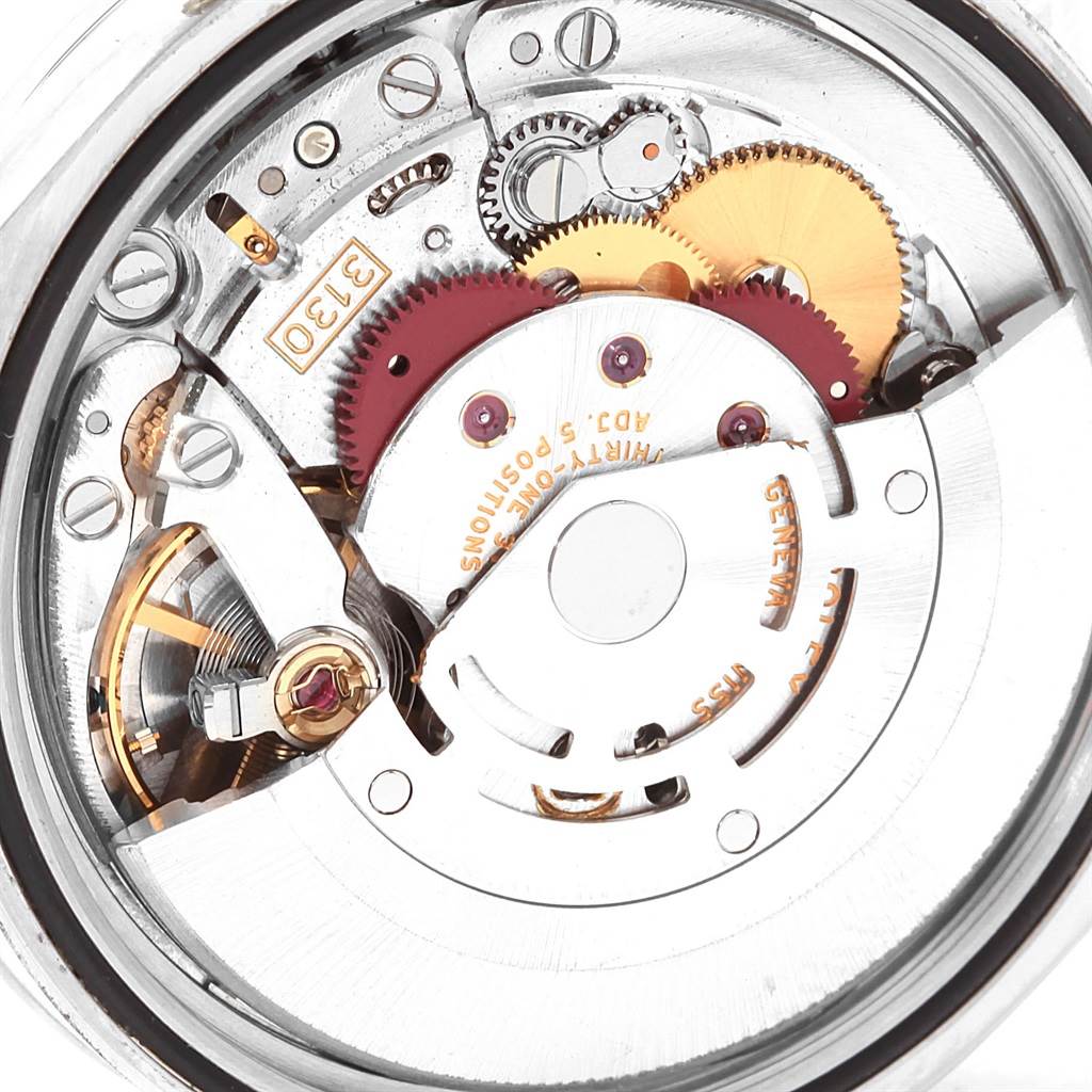 This is a close-up view of the internal mechanism of a Rolex Explorer 114270 Men's Stainless Steel Black Dial 114270 Men's Stainless Steel Black Dial watch.