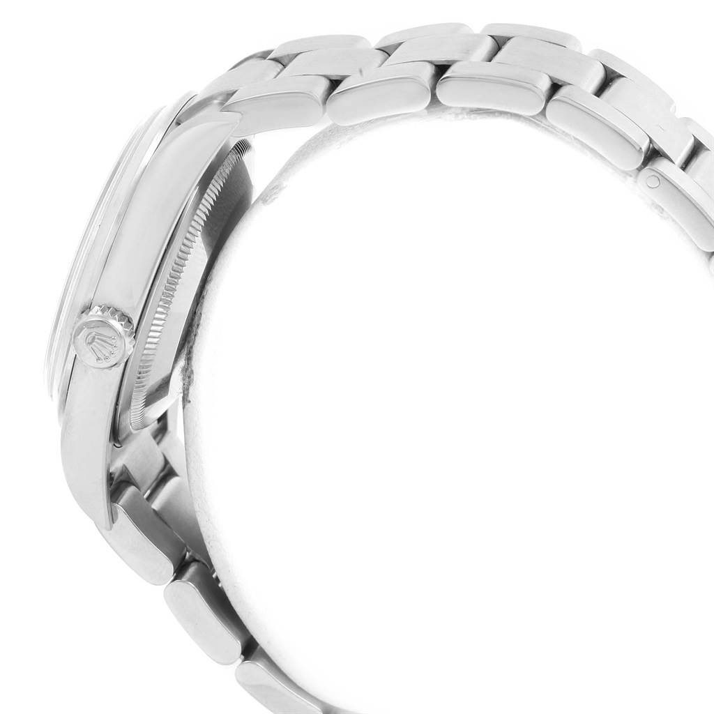 The image shows a side view of a Rolex Explorer 114270 Men's Stainless Steel Black Dial 114270 Men's Stainless Steel Black Dial model, highlighting the bracelet and crown.