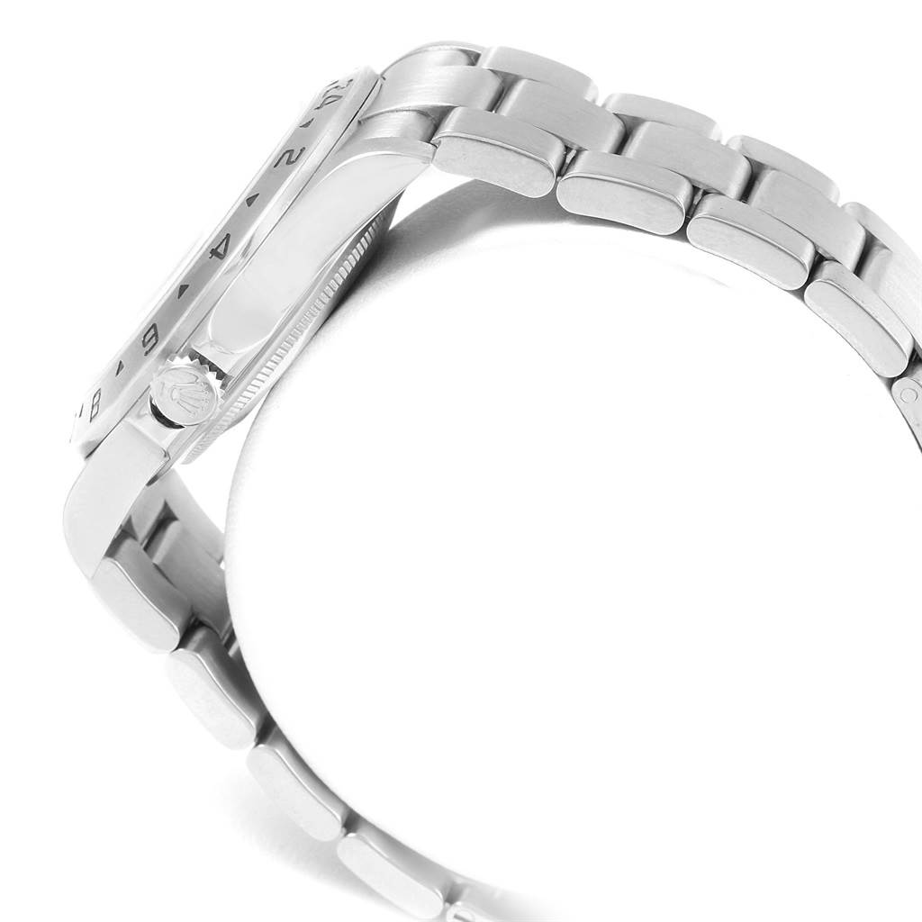 The image shows a side view of the Rolex Explorer 16570 Men's Stainless Steel White Dial 16570 Men's Stainless Steel White Dial watch, focusing on the bezel, crown, and metal bracelet.