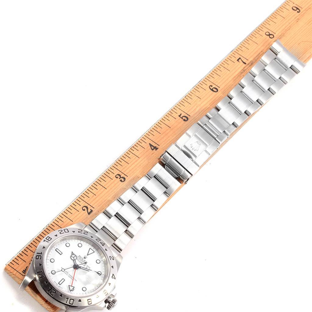 The image shows a Rolex Explorer 16570 Men's Stainless Steel White Dial 16570 Men's Stainless Steel White Dial watch from a top-down angle, featuring the face, bezel, and full metal bracelet.