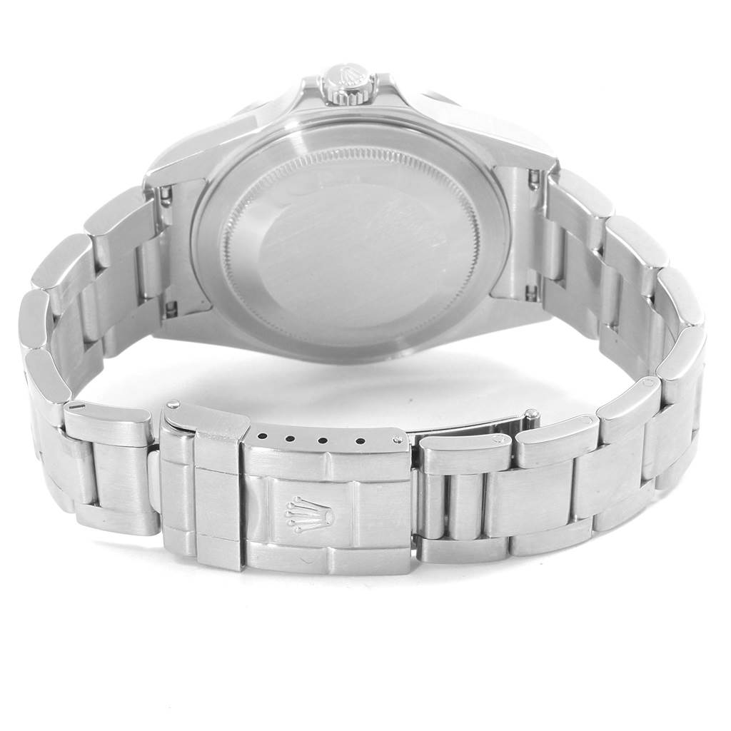 The image shows the back view of the Rolex Explorer 16570 Men's Stainless Steel White Dial 16570 Men's Stainless Steel White Dial, highlighting its case back, bracelet, and clasp with the Rolex crown logo.