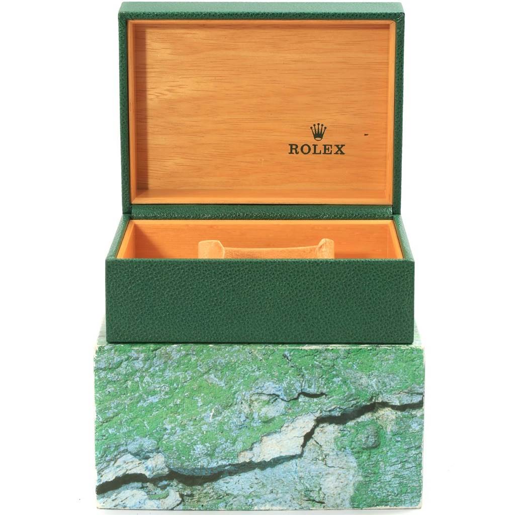 The image shows an open Rolex Explorer 16570 Men's Stainless Steel White Dial 16570 Men's Stainless Steel White Dial watch box with the lid up, displaying the interior.