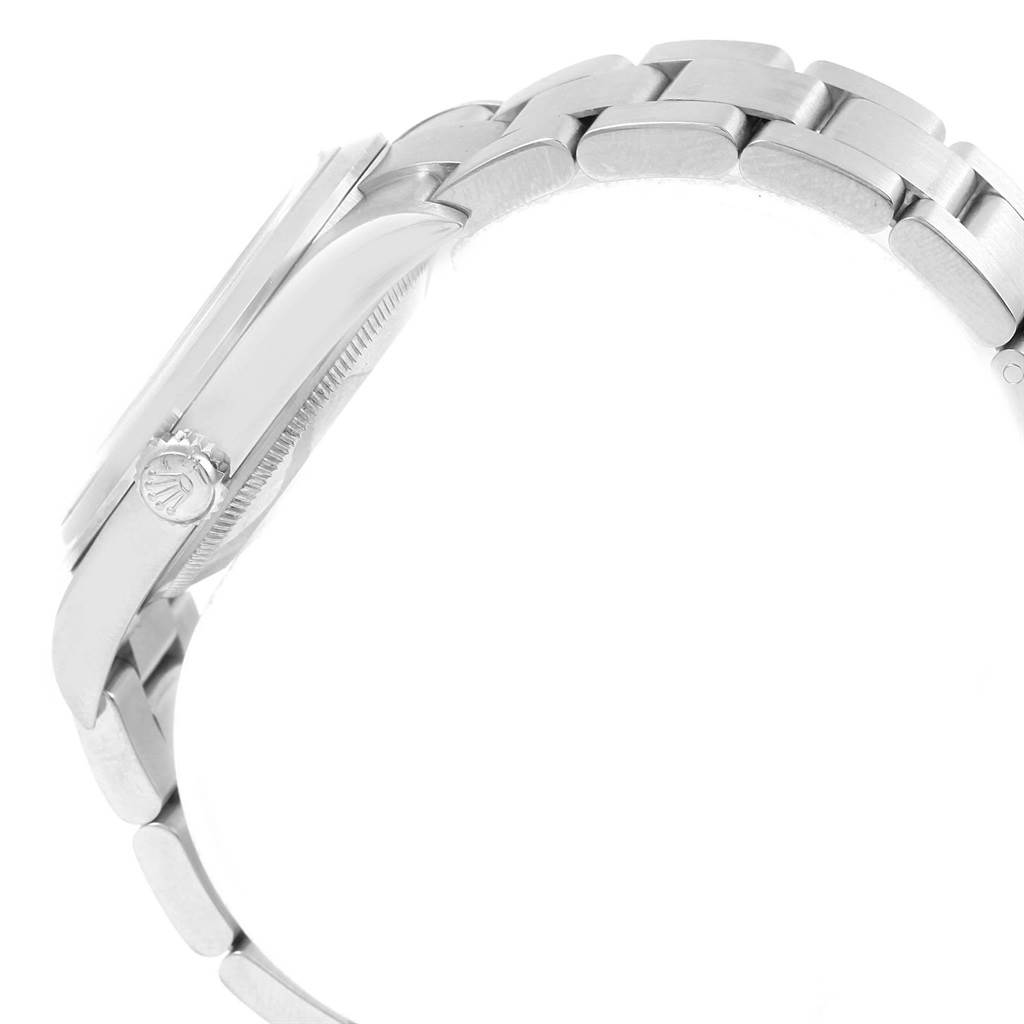 This side view of the Rolex Explorer 114270 Men's Stainless Steel Black Dial 114270 Men's Stainless Steel Black Dial watch shows the bracelet and crown with the Rolex logo.