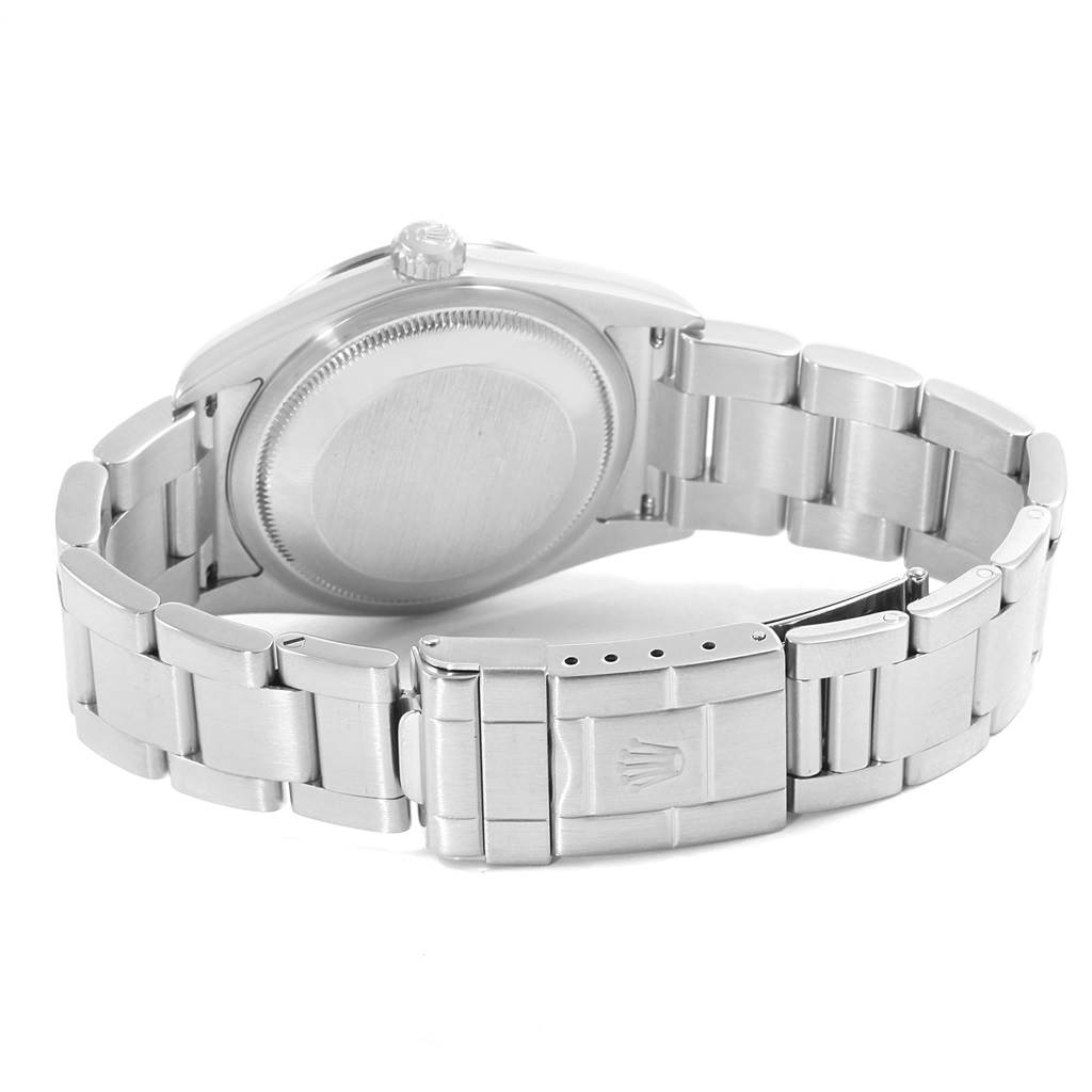 The image shows the back of the case and bracelet clasp of a Rolex Explorer 114270 Men's Stainless Steel Black Dial 114270 Men's Stainless Steel Black Dial watch.