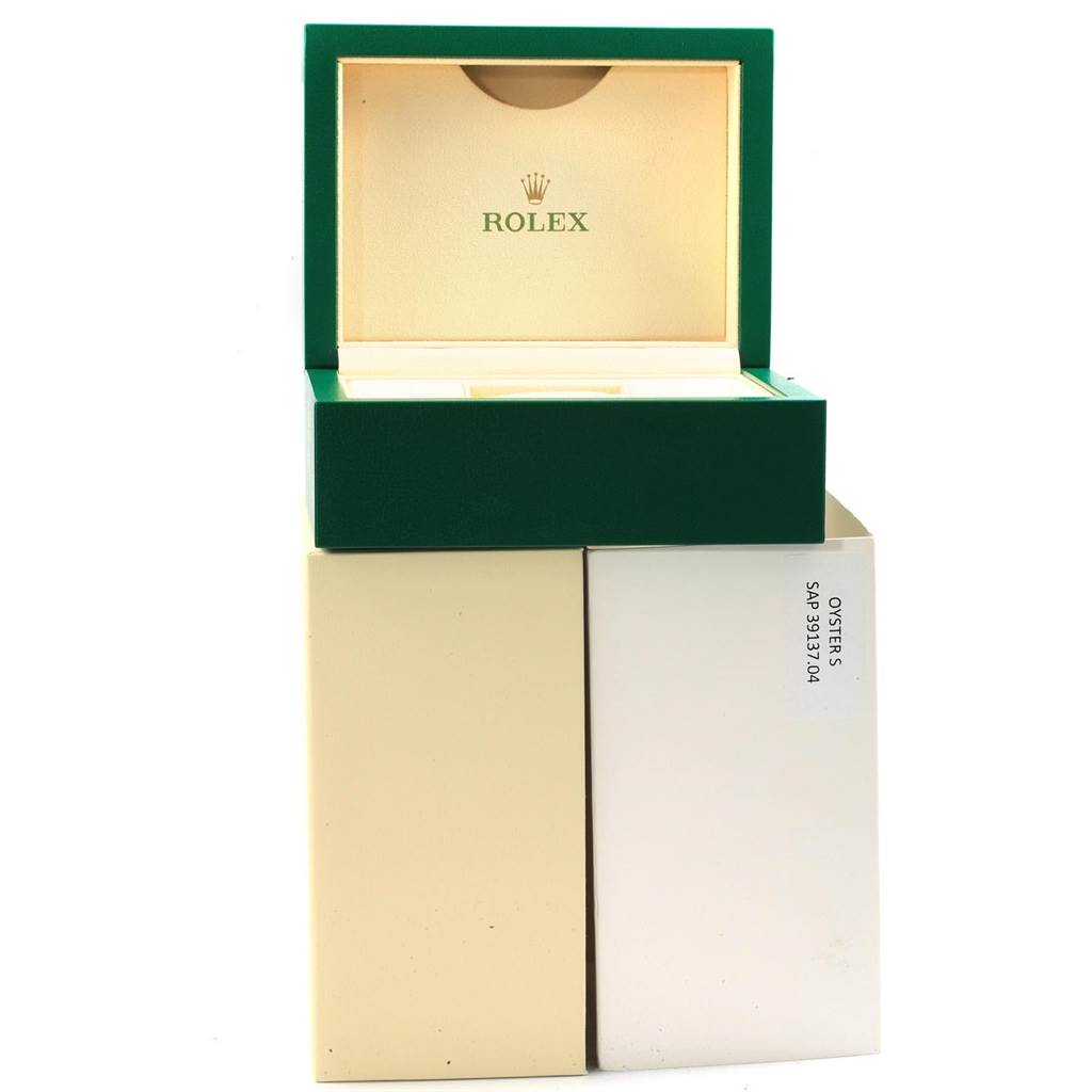 This image shows the open box and outer packaging for a Rolex Explorer 214270 Men's Stainless Steel Black Dial 214270 Men's Stainless Steel Black Dial model watch.