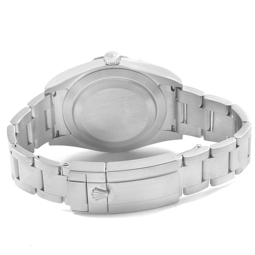 The image shows the back view of a Rolex Explorer 214270 Men's Stainless Steel Black Dial 214270 Men's Stainless Steel Black Dial watch, including the case back and the clasp of the bracelet.