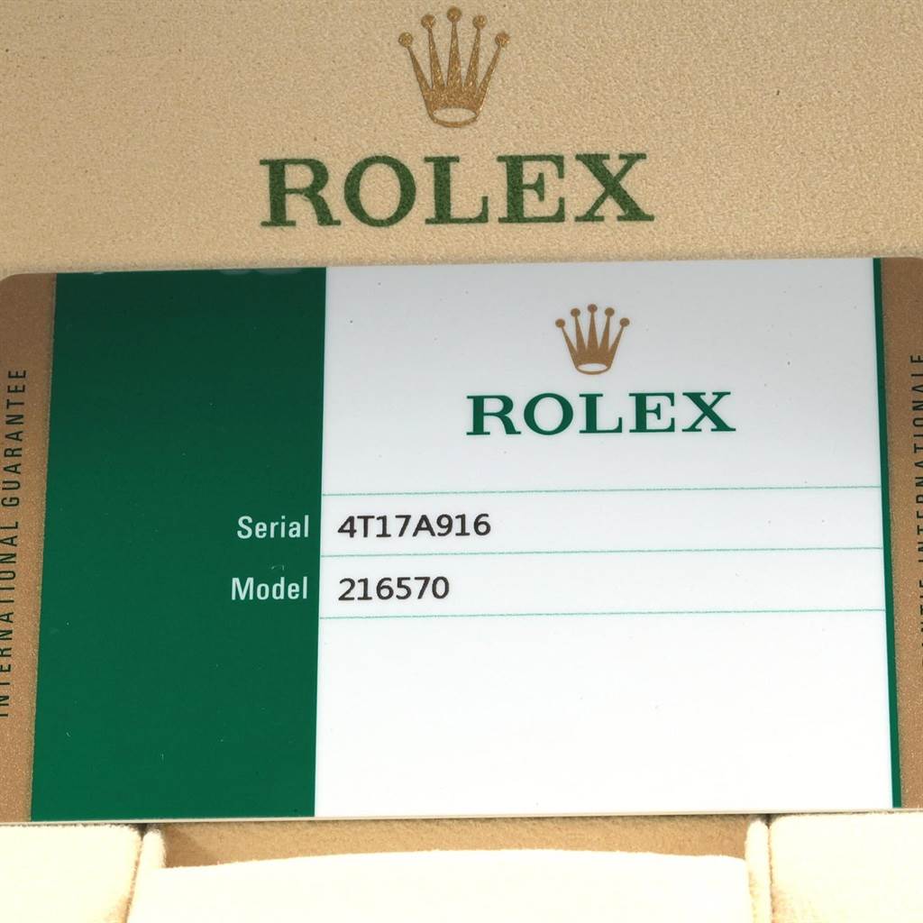 The image shows the warranty card for the Rolex Explorer 216570 Men's Stainless Steel White Dial 216570 Men's Stainless Steel White Dial model 216570, including the serial number.