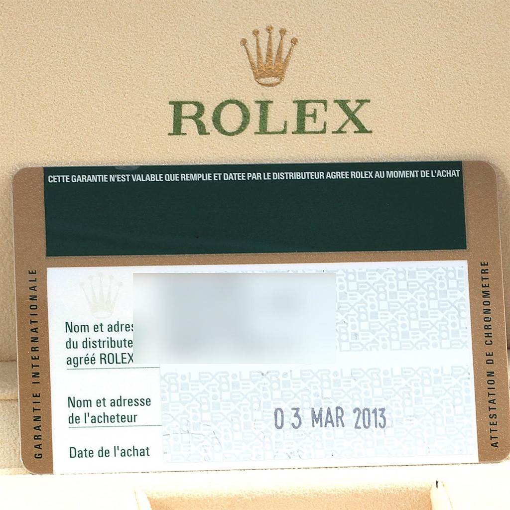The image shows a warranty card and packaging for a Rolex Explorer 216570 Men's Stainless Steel White Dial 216570 Men's Stainless Steel White Dial model, dated 03 March 2013.