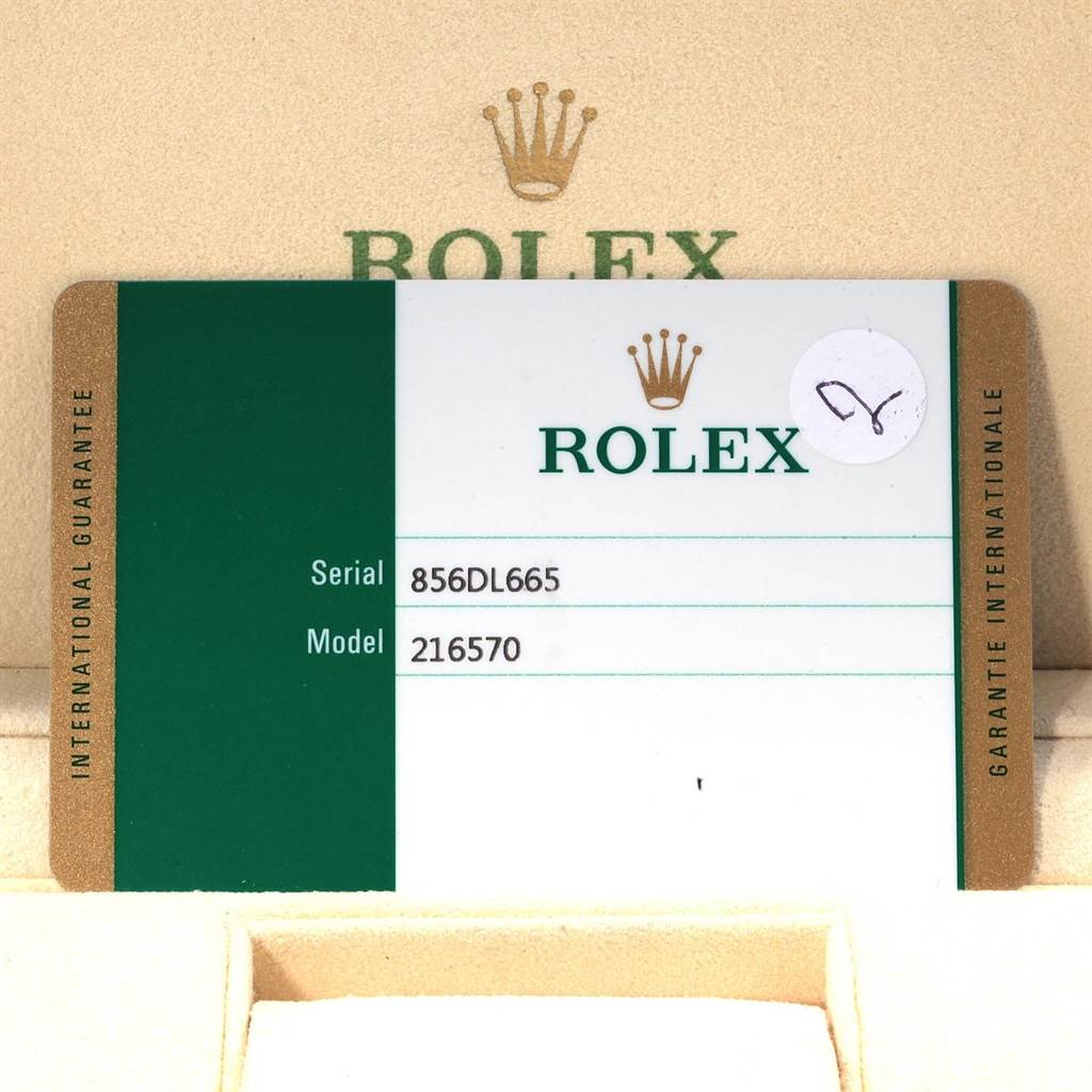 This image shows the warranty card for the Rolex Explorer 216570 Men's Stainless Steel White Dial 216570 Men's Stainless Steel White Dial, model number 216570, revealing brand details and serial number.