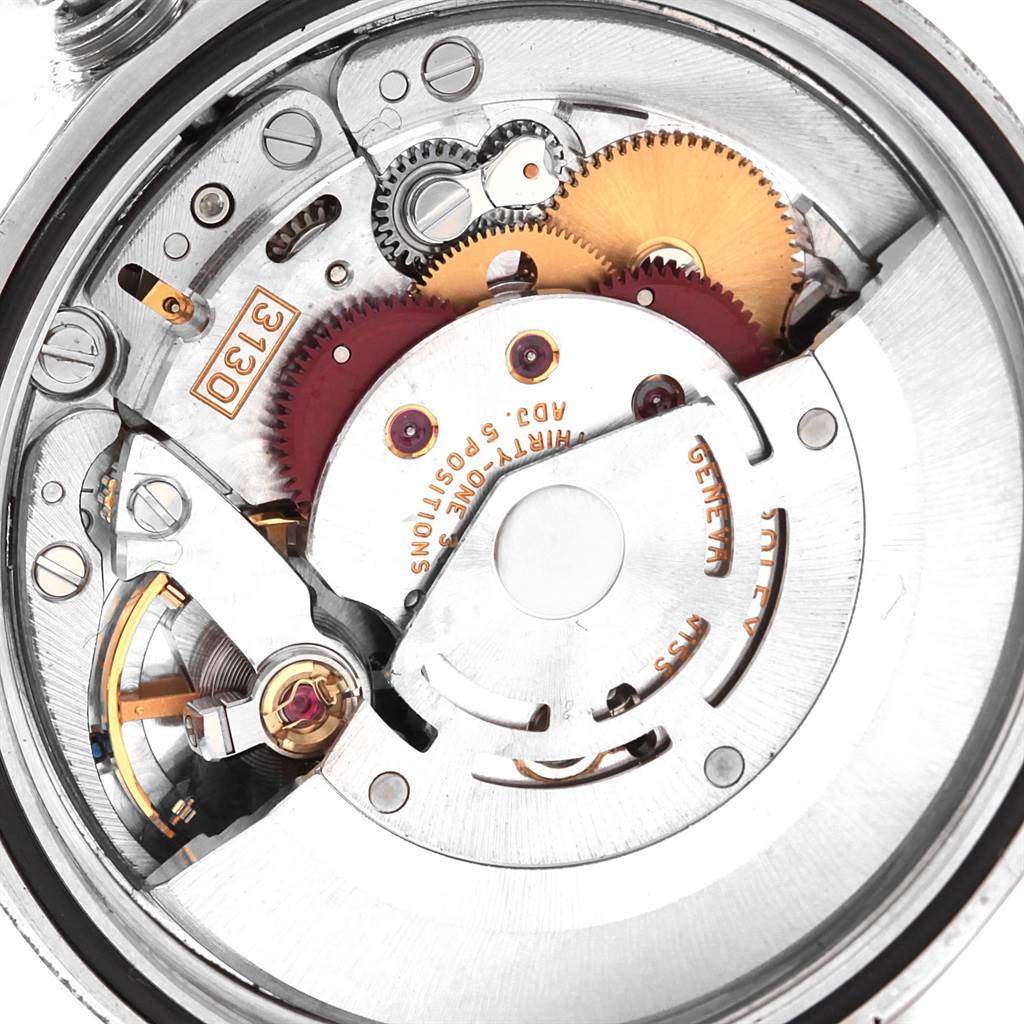 This image shows a close-up of the internal mechanical movement parts of a Rolex Explorer 114270 Men's Stainless Steel Black Dial 114270 Men's Stainless Steel Black Dial watch.