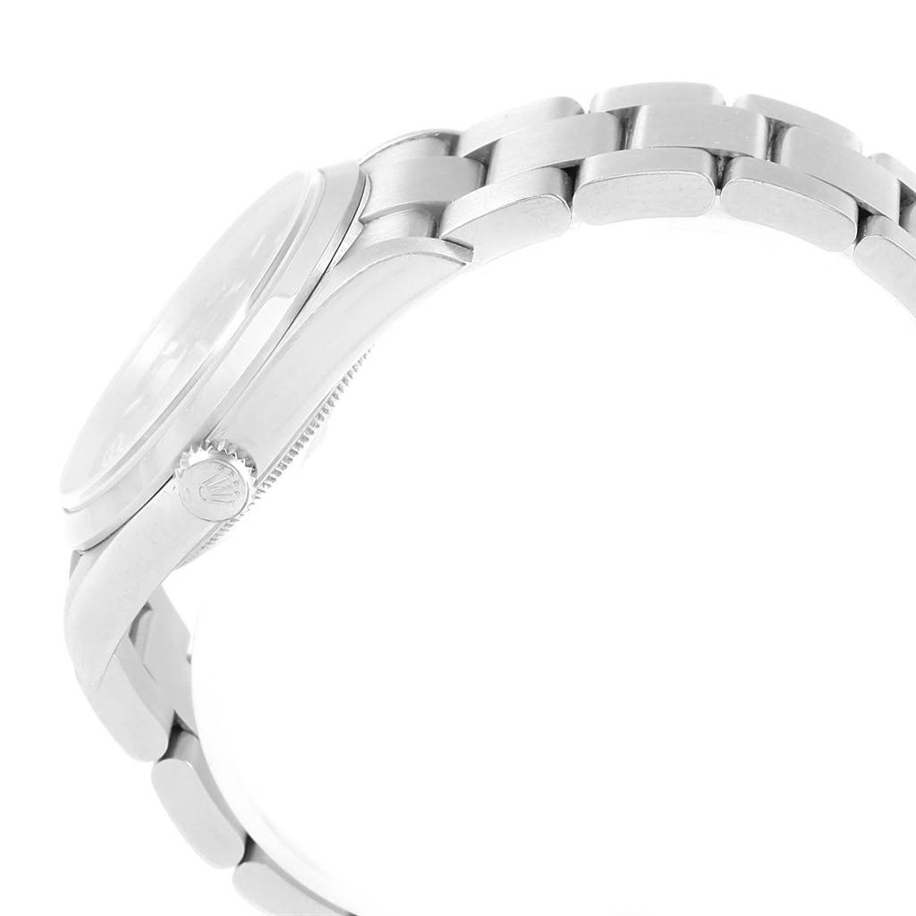 This side view of the Rolex Explorer 114270 Men's Stainless Steel Black Dial 114270 Men's Stainless Steel Black Dial watch displays the crown, bezel, and part of the bracelet.