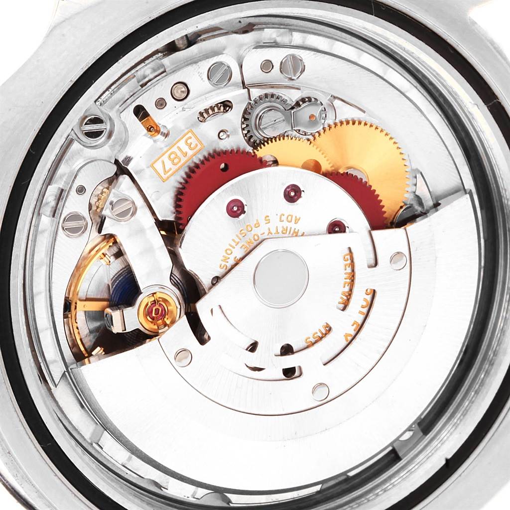 This image shows a close-up of the internal mechanical movement of a Rolex Explorer 216570 Men's Stainless Steel White Dial 216570 Men's Stainless Steel White Dial watch, showcasing its intricate gears and components.