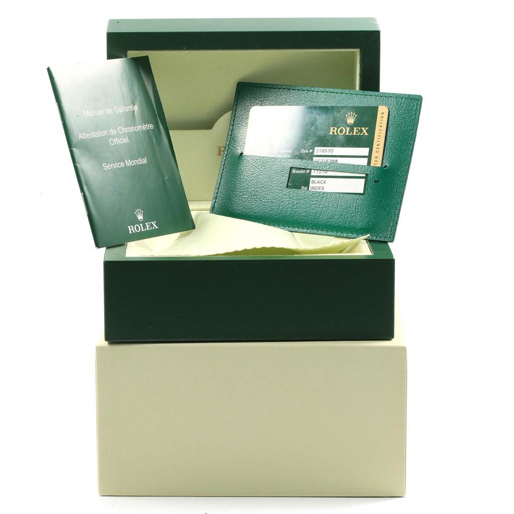 The image shows the box, manual, and warranty card for a Rolex Explorer 216570 Men's Stainless Steel Black Dial 216570 Men's Stainless Steel Black Dial watch.