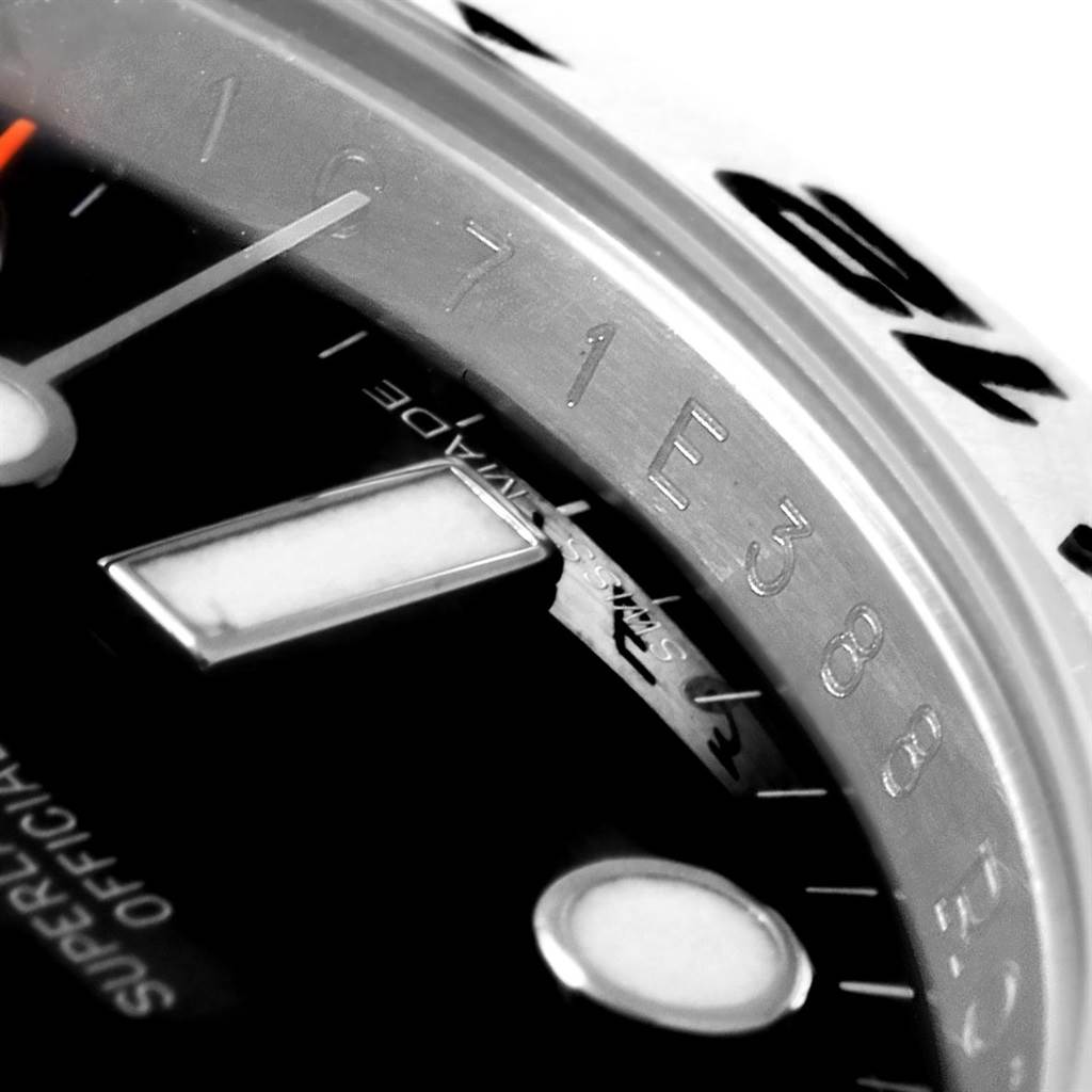 This image shows a close-up of the dial and bezel of a Rolex Explorer 216570 Men's Stainless Steel Black Dial 216570 Men's Stainless Steel Black Dial watch.