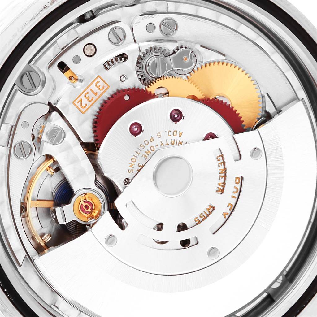 The image shows a close-up of the Rolex Explorer 214270 Men
s Stainless Steel Black Dial 214270 Men
s Stainless Steel Black Dial model
s internal movement mechanism.